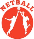 Netball player jumping ball