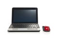 Netbook and a red mouse Royalty Free Stock Photo
