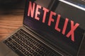 Netflix logo on laptop screen photograph