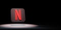 Netflix Logo Spotlighted on Black Background