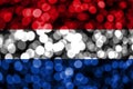 Netherlands abstract blurry bokeh flag. Christmas, New Year and National day concept flag