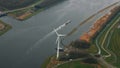 Netherlands aerial panoram view on river ship ferry wind turbine power plant ecology
