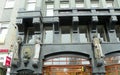 Netherlands, Amsterdam, 28 Damrak, Jumbo City, statues on the facade of the building