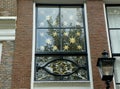 Netherlands, Amsterdam, 443 Keizersgracht, decorative wrought iron lattice over the front door