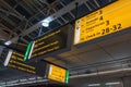 International airport Schiphol with modern arrivals and departures signs in English Royalty Free Stock Photo