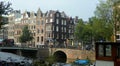 Netherlands, Amsterdam, 83 Singel, view of the bridge and houses on the waterfront Royalty Free Stock Photo