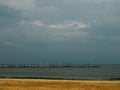 Beach, calm sea and grey sky Royalty Free Stock Photo