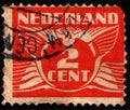 NETHERLANDS - CIRCA 1924: stamp shows stylized animal bird flying dove, value of 2 dutch cents