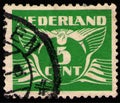 NETHERLANDS - CIRCA 1941: stamp shows stylized animal bird flying dove, value of 5 dutch cents