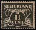 NETHERLANDS - CIRCA 1935: stamp shows stylized animal bird flying dove, value of 1.5 (one and half) dutch cents