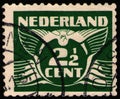 NETHERLANDS - CIRCA 1924: Postal stamp printed in the Netherlands (Holland), shows stylized animal bird flying dove