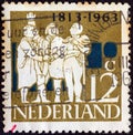 NETHERLANDS - CIRCA 1963: A stamp printed in the Netherlands shows the Driemanschap Triumvirate of 1813, circa 1963. Royalty Free Stock Photo