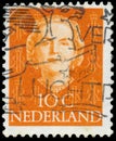 NETHERLANDS - CIRCA 1949: A stamp printed in Netherlands, shows portrait of Queen Juliana, monogram and a crown without