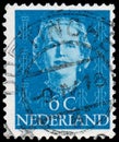 NETHERLANDS - CIRCA 1949: A stamp printed in Netherlands, shows portrait of Queen Juliana, monogram and a crown without