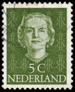 NETHERLANDS - CIRCA 1949: A stamp printed in Netherlands, shows portrait of Queen Juliana, monogram and a crown without