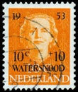 NETHERLANDS - CIRCA 1949: A stamp printed in Netherlands, shows portrait of Queen Juliana, monogram and a crown without