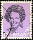 NETHERLANDS - CIRCA 1981: A stamp printed in the Netherlands shows a portrait of Queen Beatrix, circa 1981.
