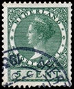 Stamp printed in the Netherlands shows Queen Wilhelmina, circa 1924 Royalty Free Stock Photo