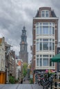 Old Cathedral at the End of a Narrow Street in Amsterdam Royalty Free Stock Photo