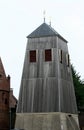 bell tower next to martini church