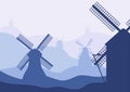 Netherlands, Holland. Dutch mills silhouettes on landscape fading hills background. Royalty Free Stock Photo
