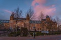 Amsterdam at summer night. Famous national Rijks museum general view at dusk