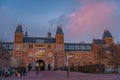 Amsterdam at summer night. Famous national Rijks museum general view at dusk