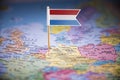 Netherlands marked with a flag on the map Royalty Free Stock Photo