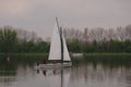 Netherlands, Roermond, Maasplassen, on the lake a Valk Jolle, a small open sailing boat with gaff sails Royalty Free Stock Photo