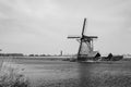 The Netherlands rural landscape with famous windmill in Kinderdijk museum in Holland. Sunny summer day in countryside. Royalty Free Stock Photo