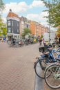 Lots of Parked Bicycles on the Street of Amsterdam