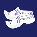 Netherlands. Vector illustration of traditional shoes with blue petals.