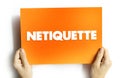 Netiquette is a set of rules that encourages appropriate and courteous online behavior, text concept on card