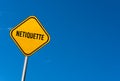 Netiquette - yellow sign with blue sky