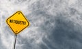 Netiquette - yellow sign with cloudy sky