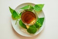 Nettle infusion with nettle leaves in a transparent cup