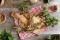 Nettle root on a wooden table, top view