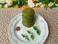 Nettles green pancakes with rose petals, Royalty Free Stock Photo