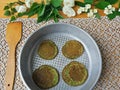 Nettles green pancakes with rose petals,