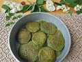 Nettles green pancakes with rose petals, Royalty Free Stock Photo