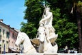 Nettuno fountain white sculpture, detail and trees, in Conegliano Veneto, Treviso, Italy