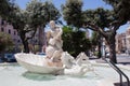 Nettuno, Italy â10 June 2018: Marble Fountain of Neptune (Fontana del dio Nettuno). Statue of Poseidon Royalty Free Stock Photo