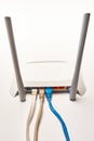 Network cable connects to wireless router, router, internet, global network. Royalty Free Stock Photo