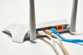 Network cable connects to wireless router, router, internet, global network. Royalty Free Stock Photo