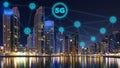 Network connection of future technology with 5g wireless and internet networking sign in night cityscape, communication in city