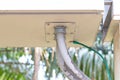 Network electric cable with metal flex pipe connected under to Internet set-top box by nut. Royalty Free Stock Photo