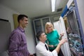 Network engeneers working in network server room Royalty Free Stock Photo