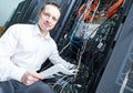 Network engineer administrating in server room Royalty Free Stock Photo