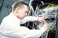 Network engineer administrating in server room Royalty Free Stock Photo