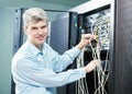 Network engineer administrator in server room Royalty Free Stock Photo